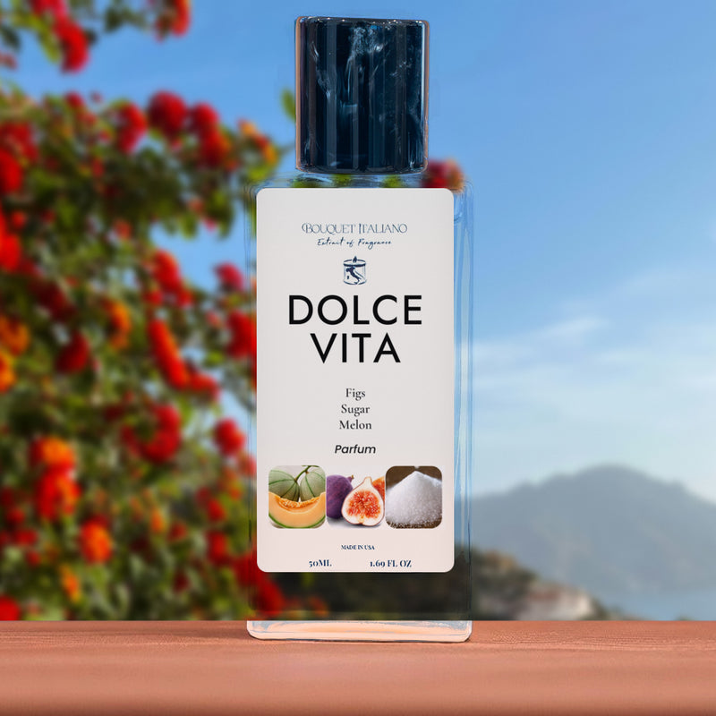 DOLCE VITA Luxury Travel Perfume 50 mL bottle with black cap, green foliage and mountains behind