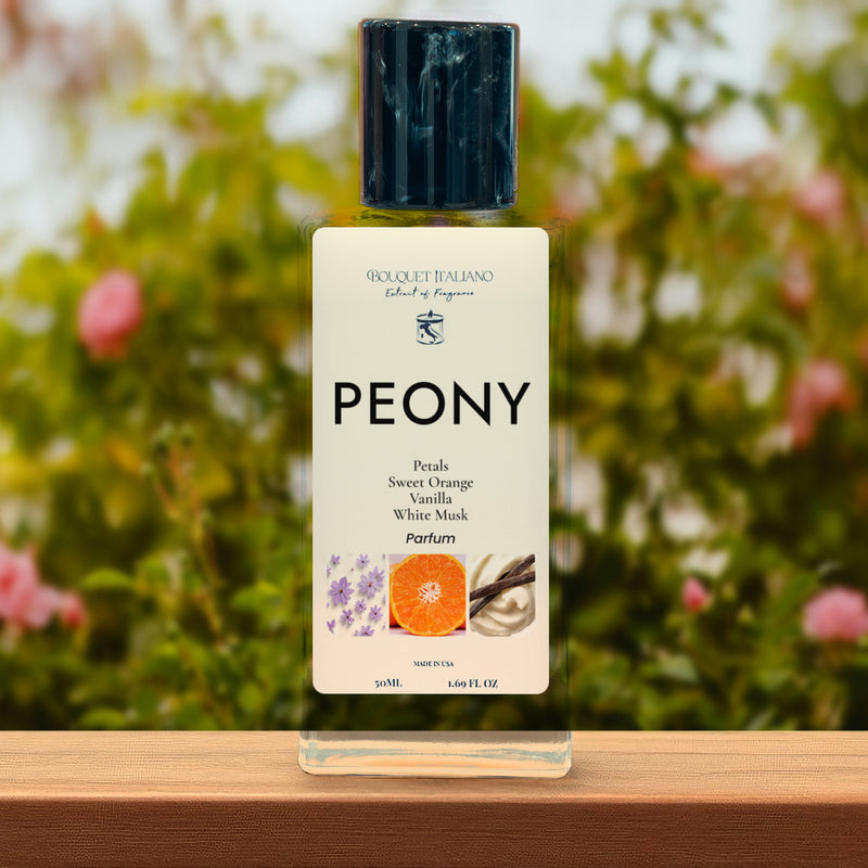 PEONY Luxury Travel Perfume 50 mL bottle with black cap, pink peonies and greenery behind