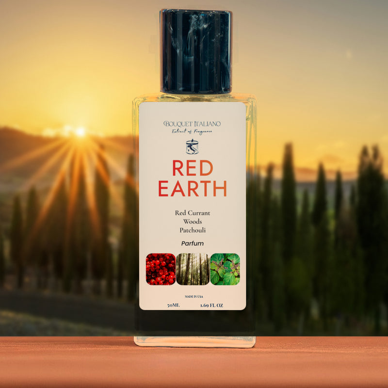 RED EARTH Luxury Travel Perfume 50 mL bottle with black cap, sunset over a cypress road behind